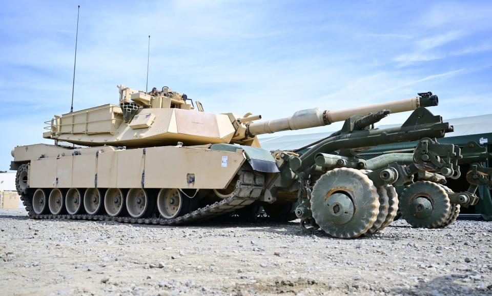 A US Army M1A1 Abrams tank, photographed with mine roller mounted