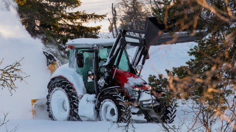 A tractor in the snow