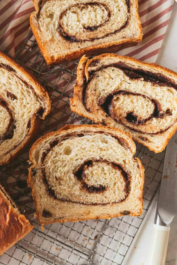 freshly baked and sliced cinnamon raisin swirl bread