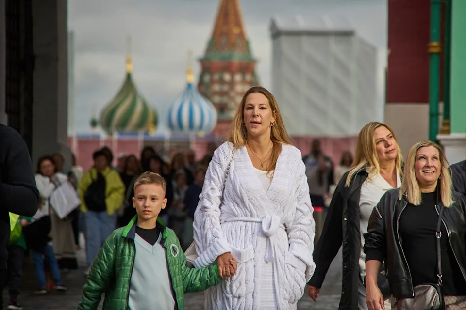 People walk from Red Square with St. Basil's Cathedral in the background in Moscow, Russia, Thursday, Aug. 14, 2025. (AP Photo/Alexander Zemlianichenko, File) (Copyright 2025 The Associated Press. All rights reserved.)
