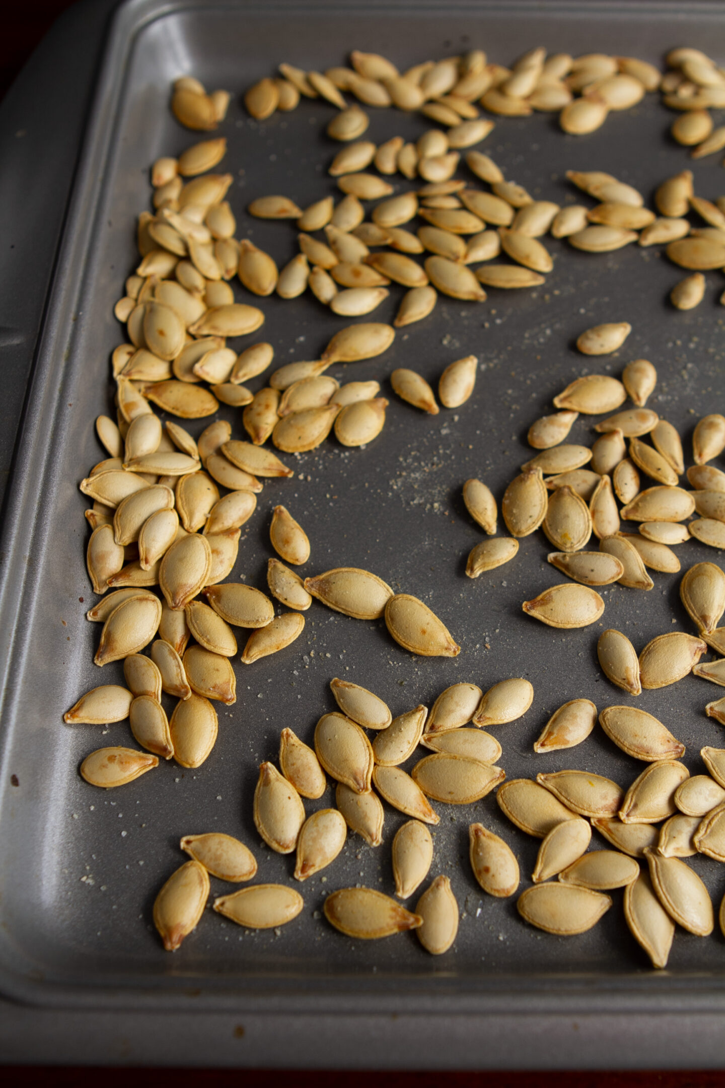 Roasted Pumpkin Seeds on Baking Sheet